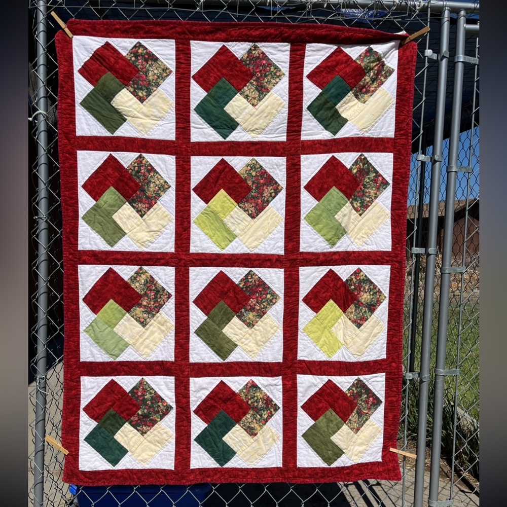 Homemade “Card Trick” pattern quilt. 43” x 56”.